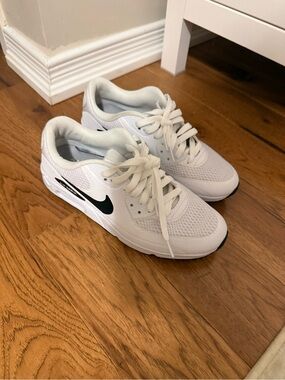 Nike womens White Sneakers with Black Swoosh